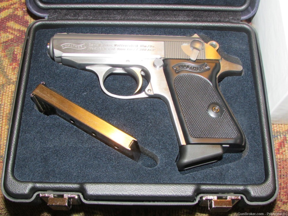  STAINLESS STEEL,WALTHER PPK IN .380, WITH HARD CASE TWO MAGS.-img-0