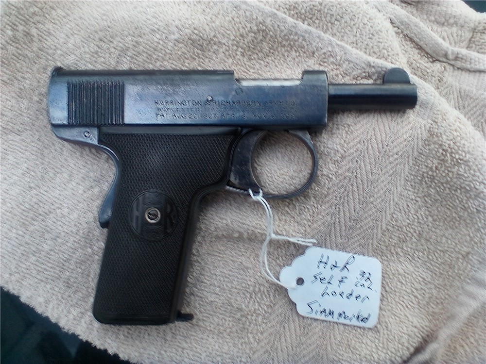 H&R 32 cal. self loader pistol-C&R  ser # S213-Siamese 1920 contract marked-img-1