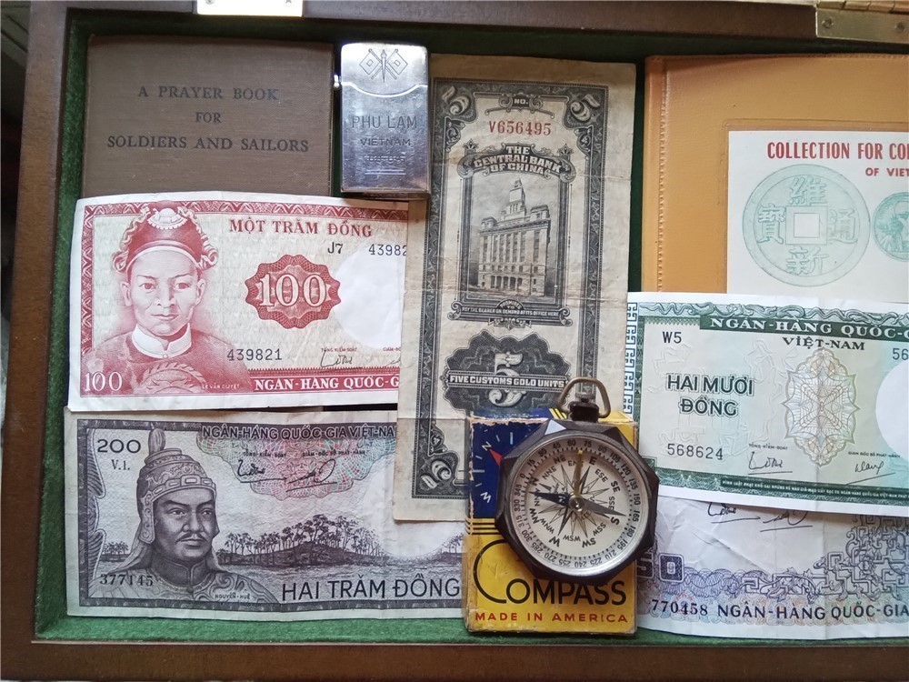 Vietnam Currency,compass, Prayer book, coin book, & Zenith 1968 lighter-img-0