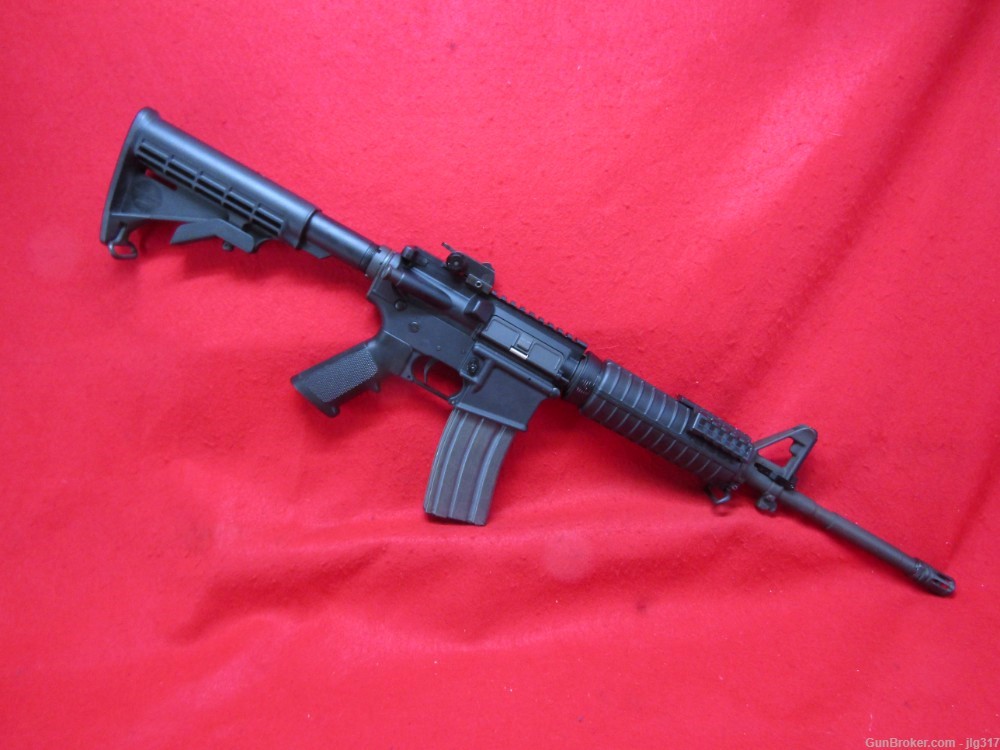 Bushmaster XM15-E2S AR-15 5.56 Nato Semi Auto Rifle Safety 30 Rd Metal Mag-img-0