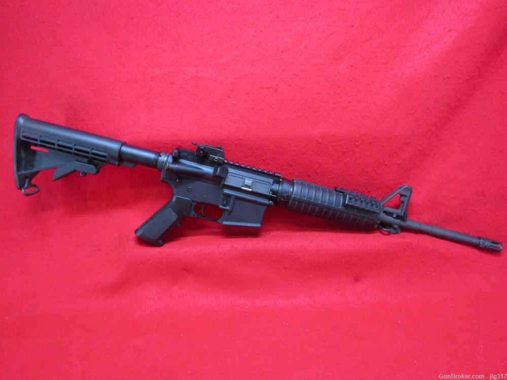Bushmaster XM15-E2S AR-15 5.56 Nato Semi Auto Rifle Safety 30 Rd Metal Mag-img-1