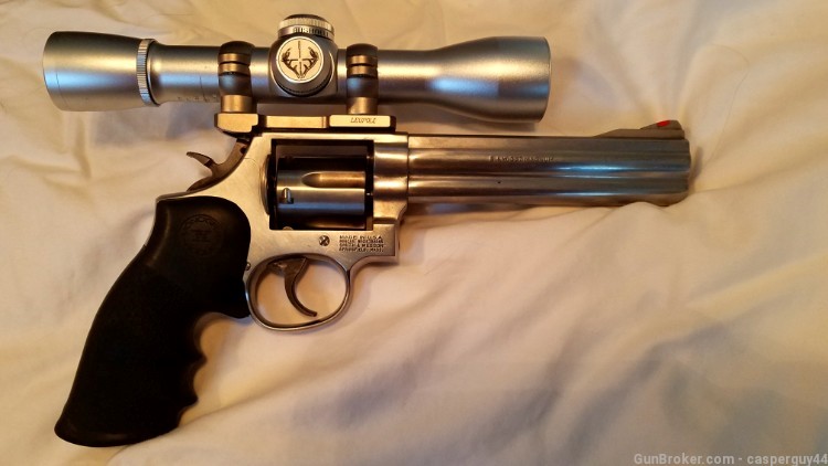 Smith and Wesson 686-4 .357 W/ Leupold mount rings and Bushnell scope-img-1