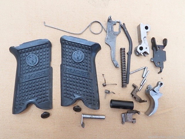 Ruger P94 9mm Pistol Internal Parts Lot with Grips & Grip Screws-img-0