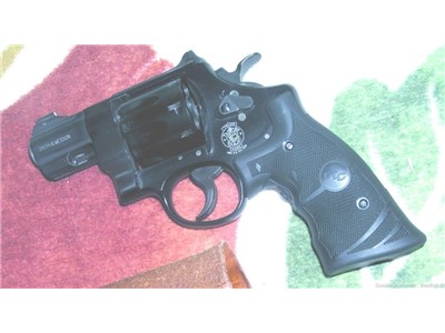 S&W 327NG 357mag 8-shot w/Crimson Trace laser grips, pocket holster