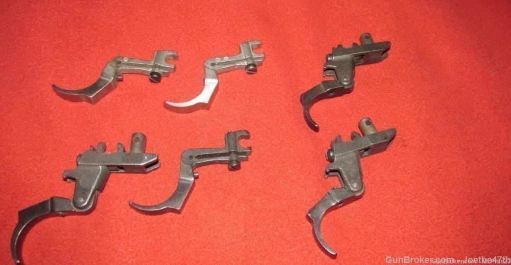 Lot of 6 old model Ruger 77 triggers-img-1