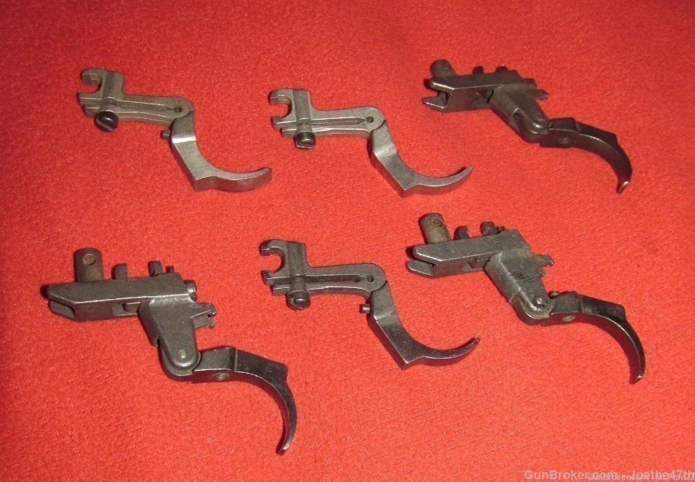 Lot of 6 old model Ruger 77 triggers-img-0
