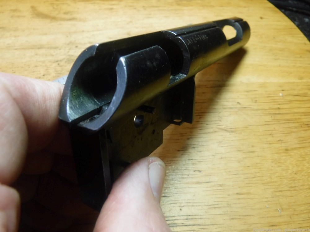 Marlin 122 Receiver with a part inside of it.22 l/r rifle part.-img-6