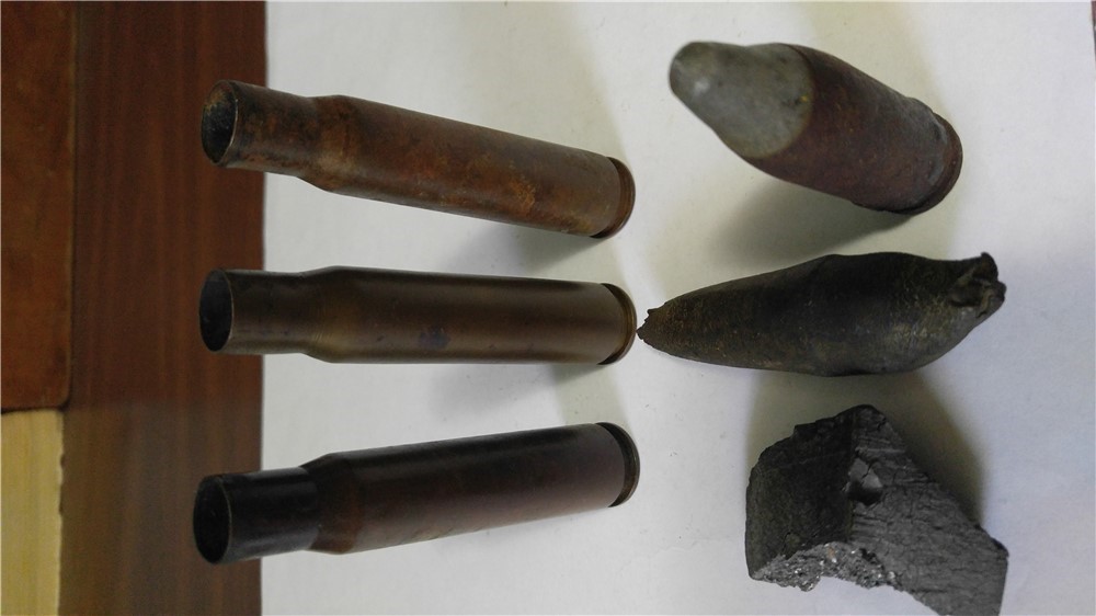 .50 bmg casings and recovered 20mm projectiles-img-0