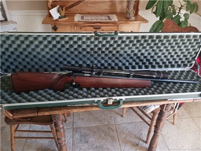 H&R M12 22LR With 24X Redfield scope