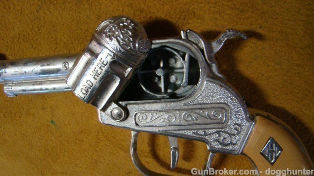 Leslie Henry Diamond H Laramie Cap Gun-img-4