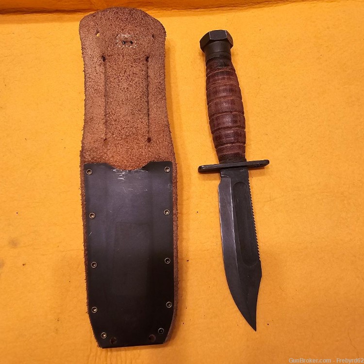1986 Ontario Survival Knife with sheath and stone.-img-2