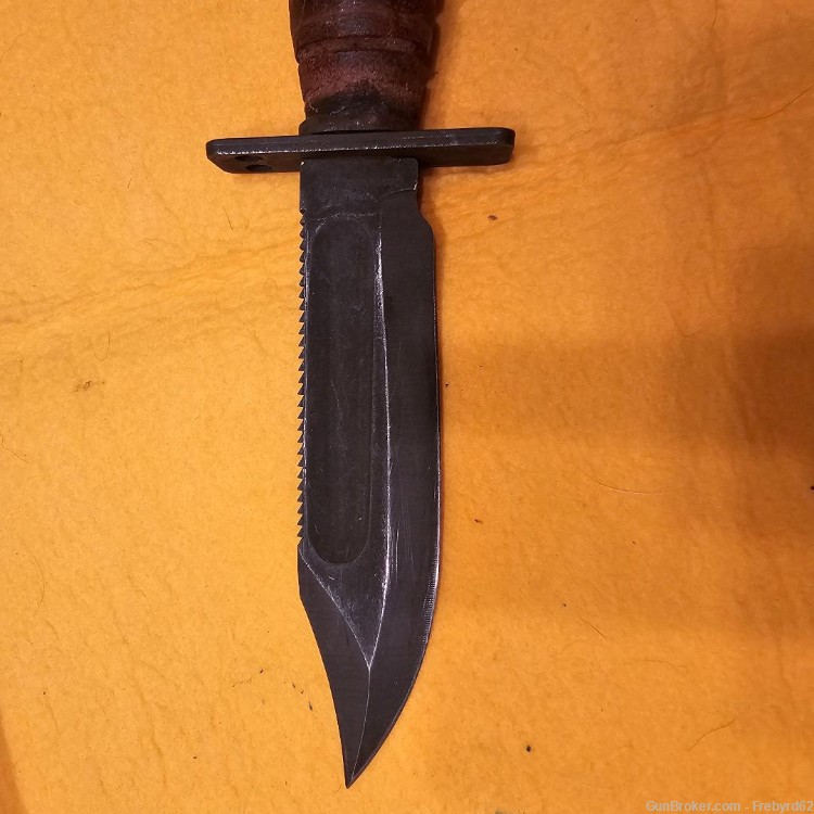 1986 Ontario Survival Knife with sheath and stone.-img-5
