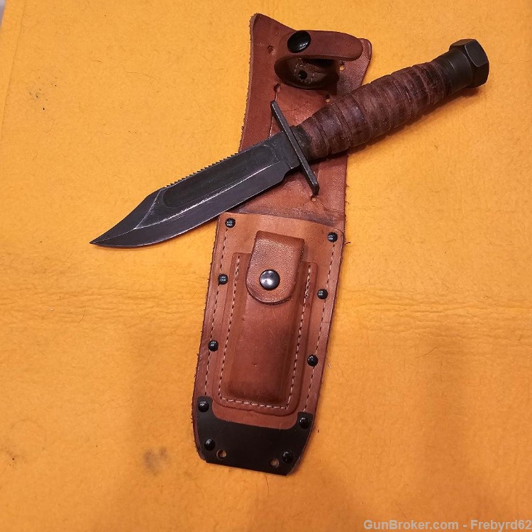 1986 Ontario Survival Knife with sheath and stone.-img-8