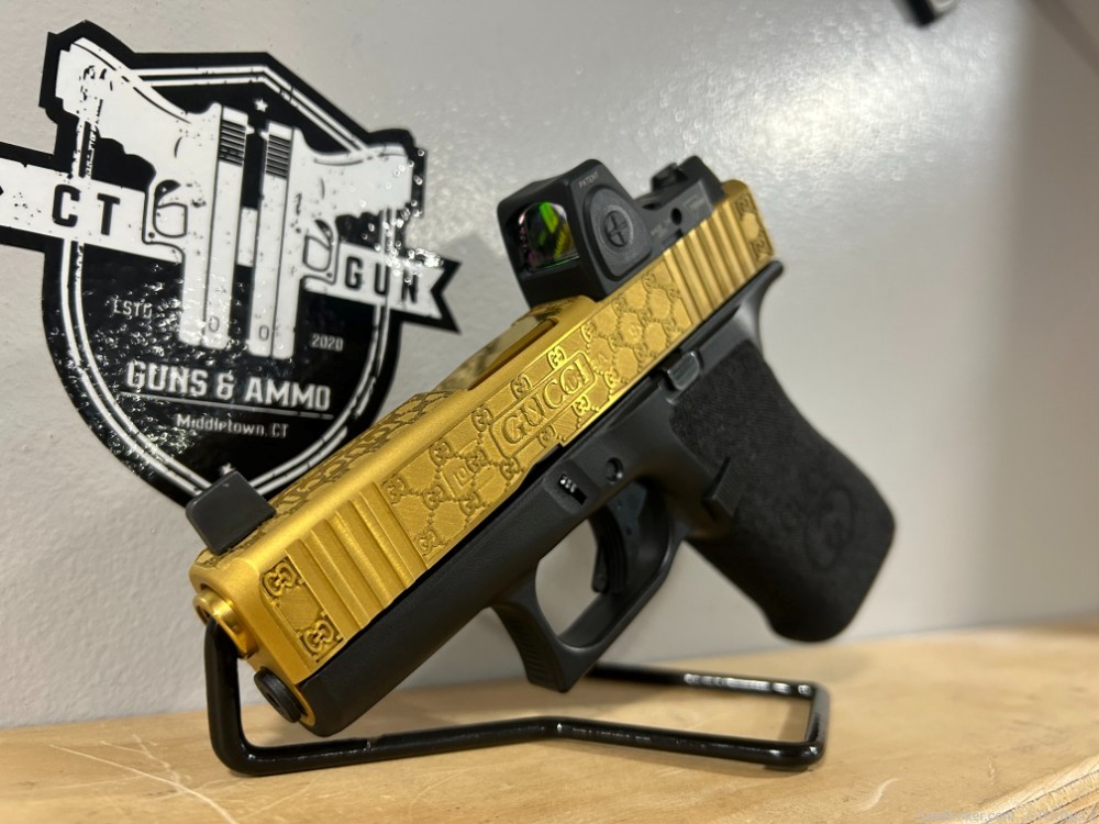 Glock 43x 9mm Custom Gucci Engraved and Gold Tin Coated -img-0