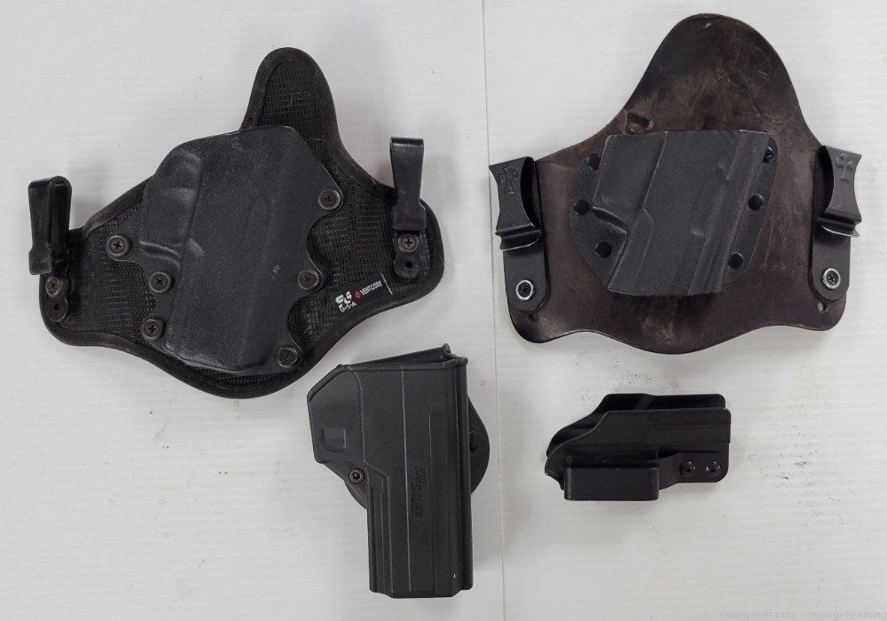 HOLSTER BONANZA - 4 PACK OF PRE-OWNED R/H HOLSTERS FOR SIG SAUER P320-img-0