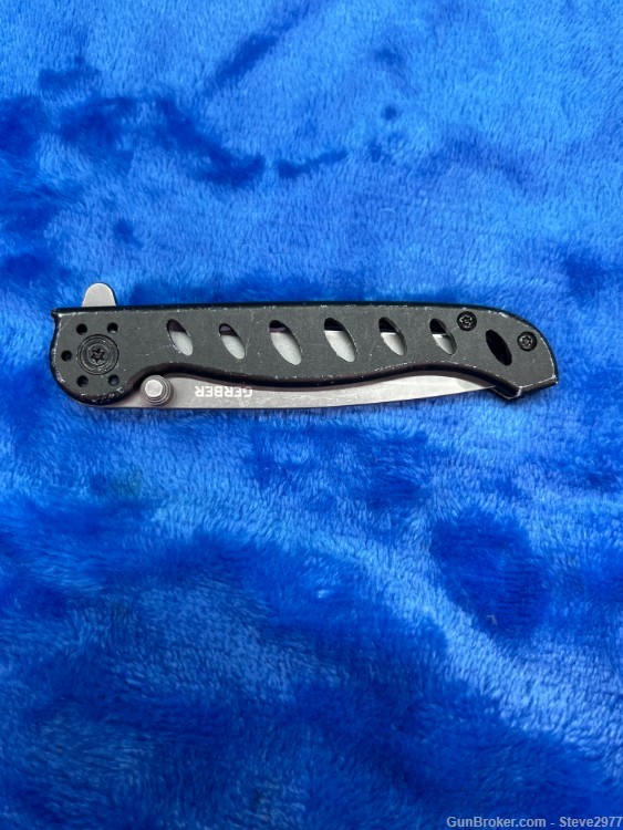 Gerber EVO 4660920A black single blade locking knife with a metal belt clip-img-4