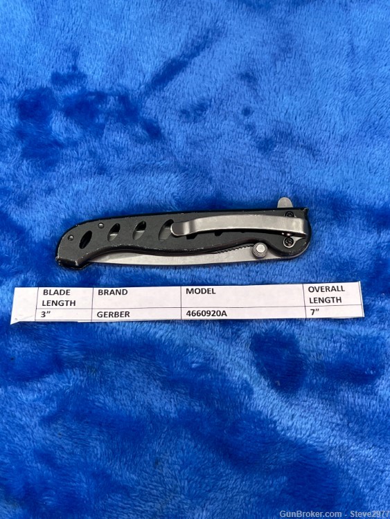 Gerber EVO 4660920A black single blade locking knife with a metal belt clip-img-9