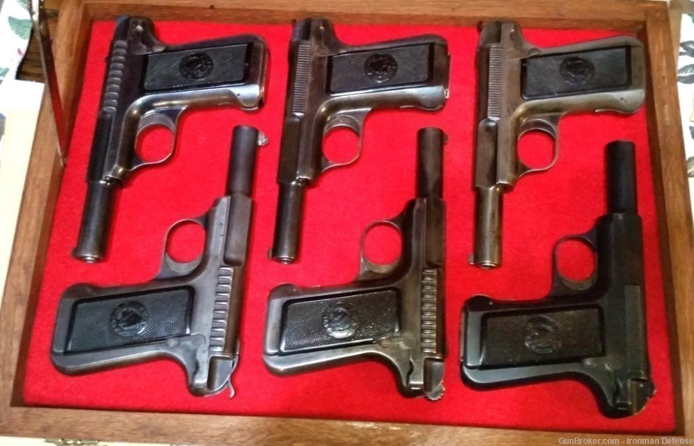 SAVAGE 1907 .32 ACP Pistol. LOT OF SIX in presentation case. One Rare.-img-0