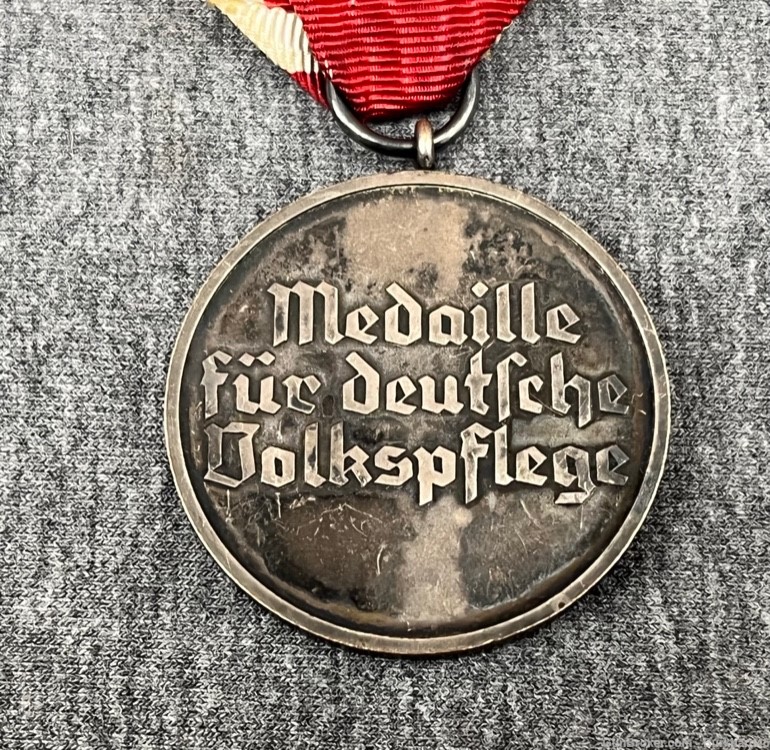 Original WWII German Social Welfare Medal w/ Award Certificate and Ribbon -img-8