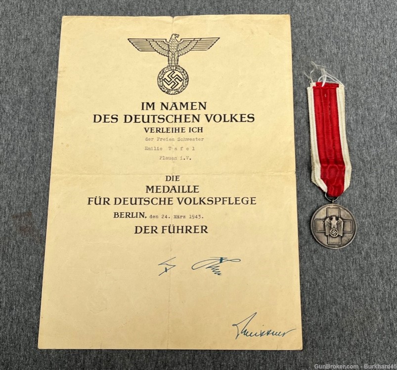 Original WWII German Social Welfare Medal w/ Award Certificate and Ribbon -img-0