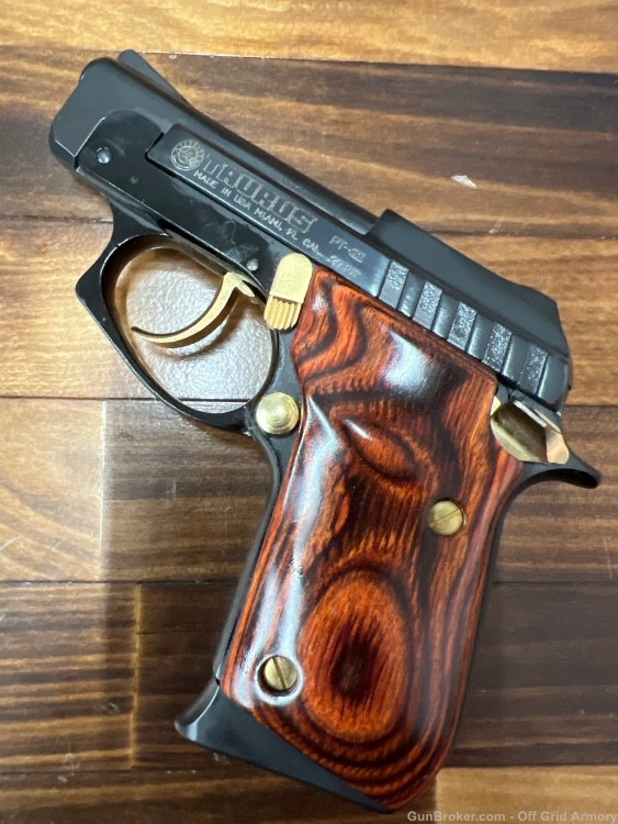 TAURUS PT-22 GOLD & ROSEWOOD W/ 3 MAGS!-img-1