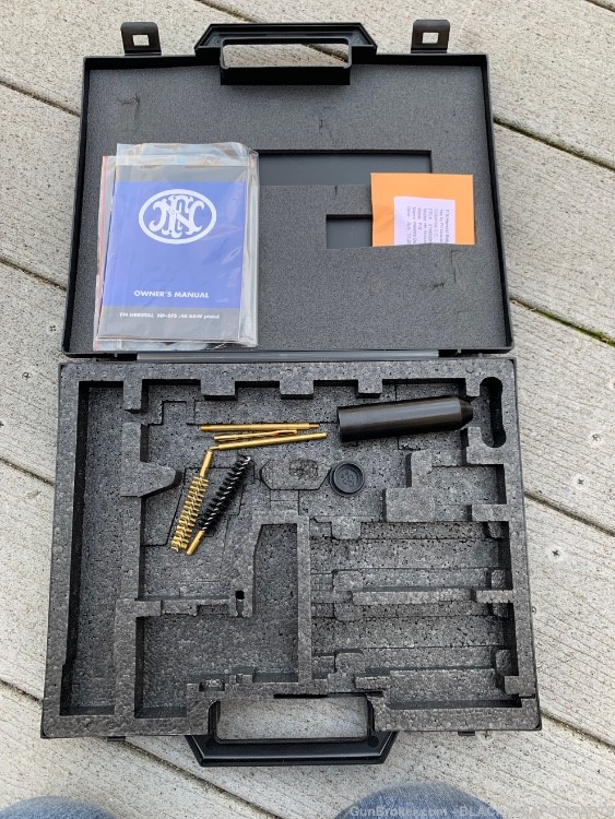 Early Empty case for FN model 57 5.7x28mm comes with cleaning kit , manual-img-0
