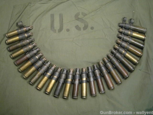 50 Cal BMG Fired Blanks Brass Casing Linked Belt 25pc US Military 1982-img-0