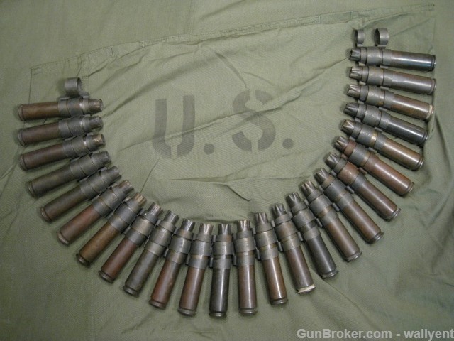 50 Cal BMG Fired Blanks Brass Cases Linked Belt 25pc US Military 1985 LC85 -img-0