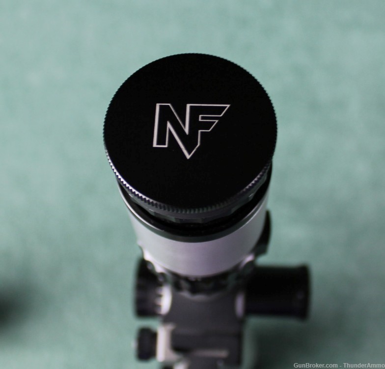 Nightforce 15-55x52mm Limited Edition Silver/Black 1/8 MOA Clicks W/ Rings-img-7