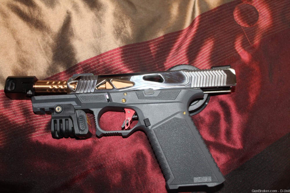 Alpha Wolf slide, Zev barrel and comp, Killer Inovations trigger Glock 17!-img-8