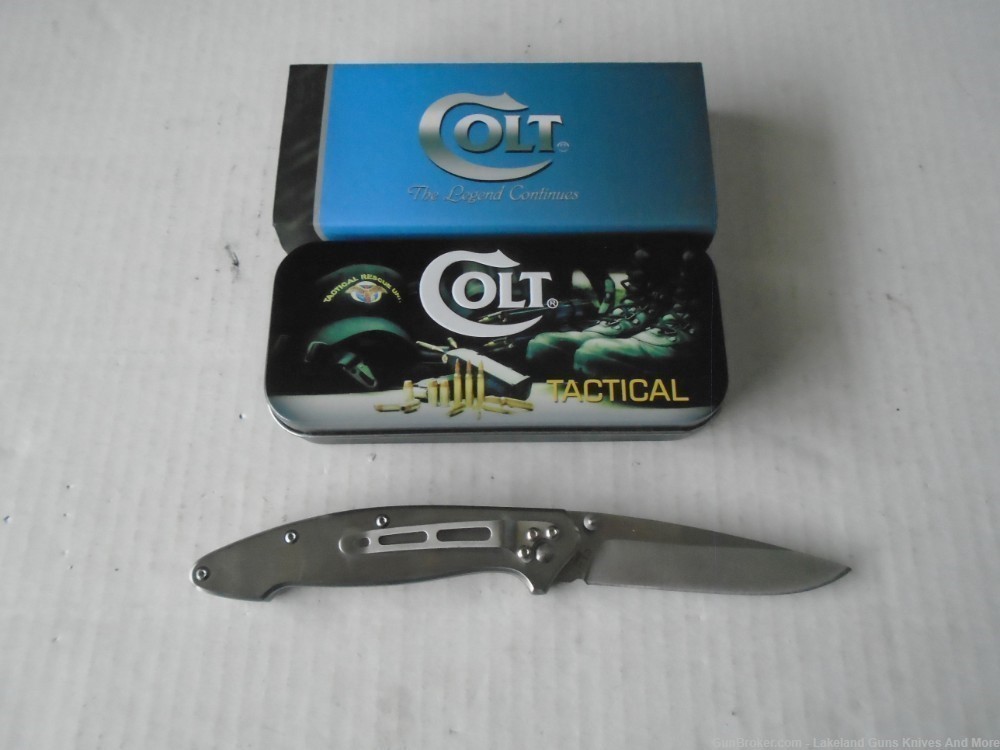 NIB COLT Push Button Solid Stainless Steel Framelock Knife!-img-2