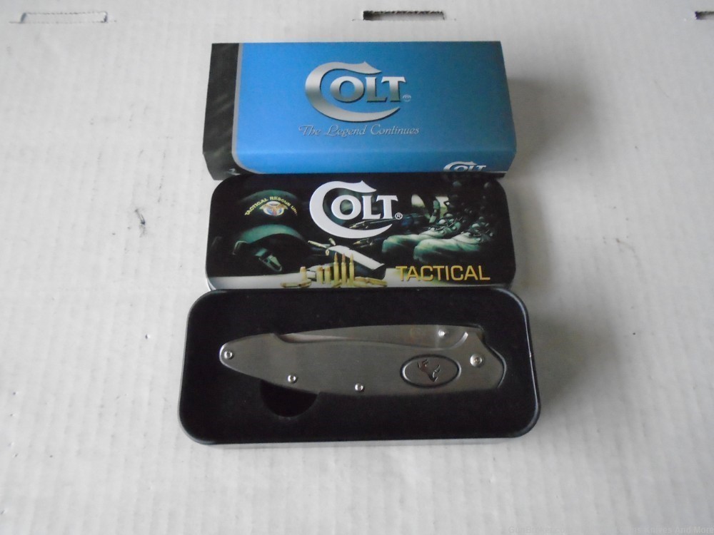 NIB COLT Push Button Solid Stainless Steel Framelock Knife!-img-10