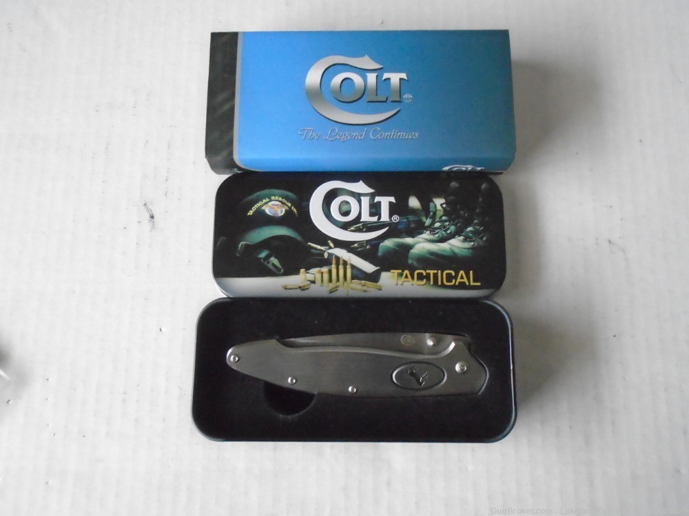 NIB COLT Push Button Solid Stainless Steel Framelock Knife!-img-9