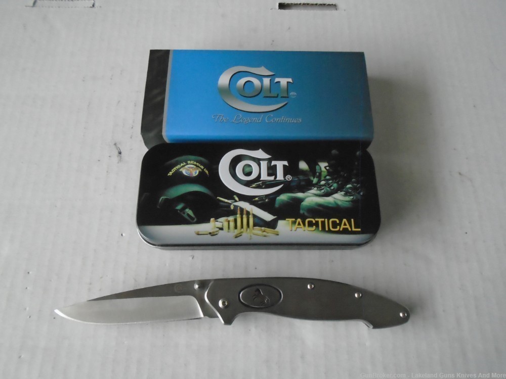 NIB COLT Push Button Solid Stainless Steel Framelock Knife!-img-0