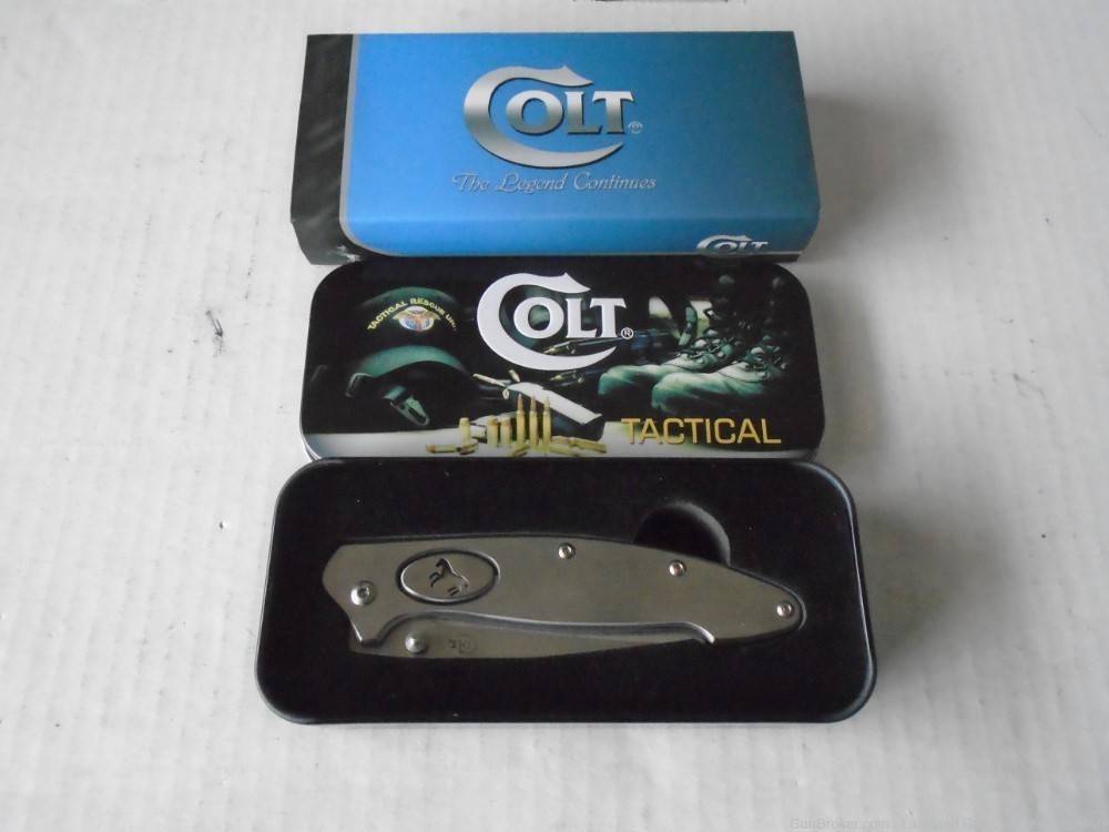 NIB COLT Push Button Solid Stainless Steel Framelock Knife!-img-11