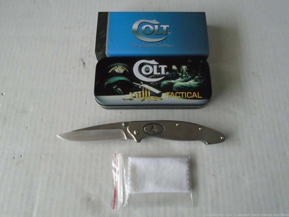 NIB COLT Push Button Solid Stainless Steel Framelock Knife!-img-8