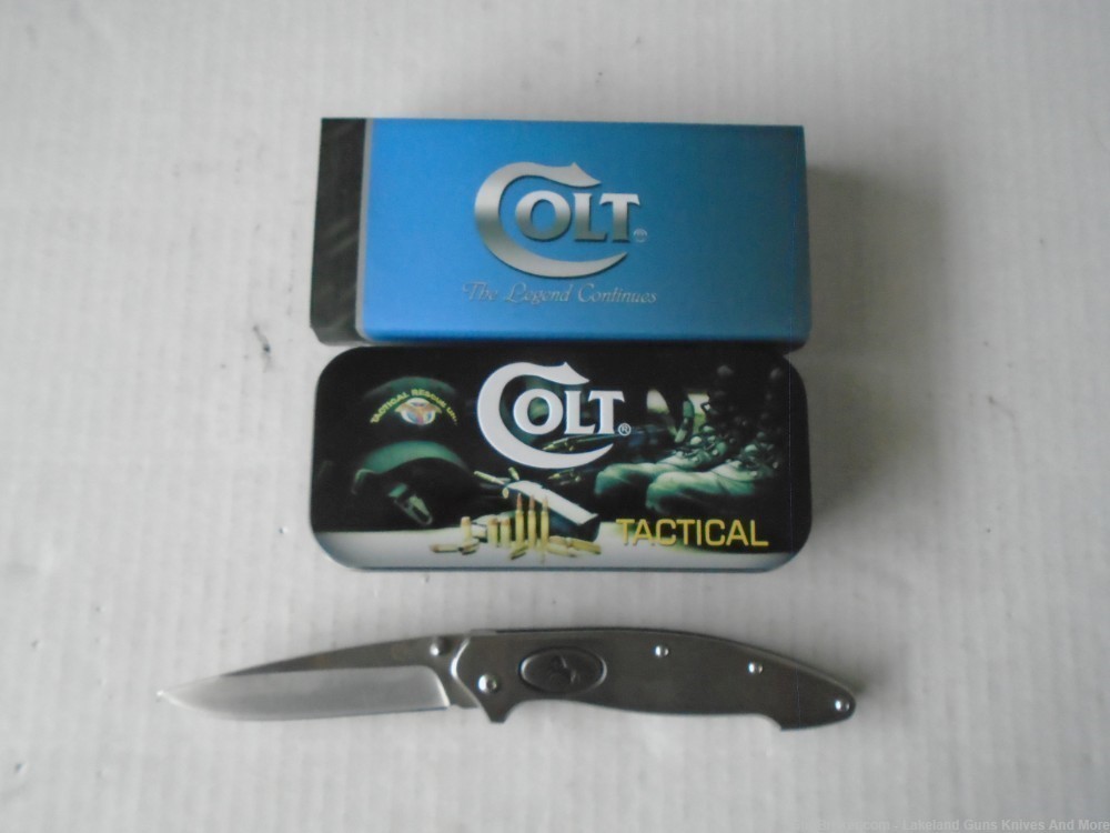 NIB COLT Push Button Solid Stainless Steel Framelock Knife!-img-1