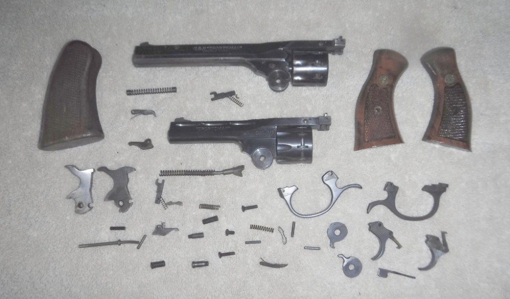 TWO (2) H&R M999 "SPORTSMAN" .22 REVOLVER PARTS SETS.  VG+-img-0