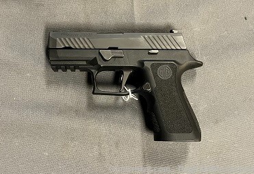 Used Sig Sauer P320 w/ grip modules and extra slide-img-0