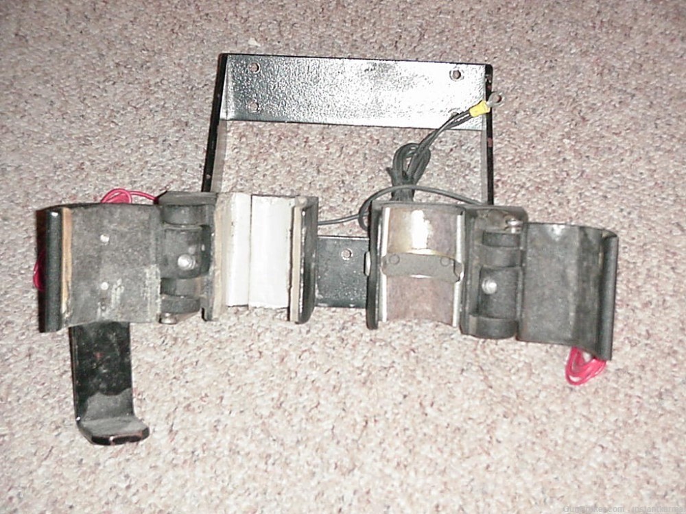 Automotive double electric gun rack, used.-img-0