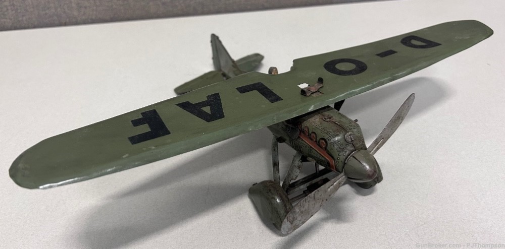 Vintage Original WW2 German Tipp Co D-OLAF Wind-Up Tin Bomber Plane -img-0
