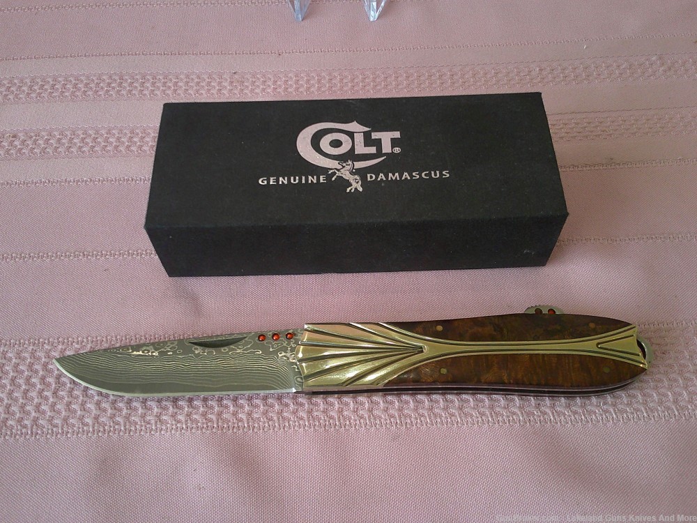 Here it is Uber Rare Colt Genuine Damascus Blade Wood Handle Knife 500 Made-img-0