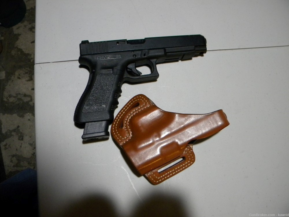 USED GLOCK 34 , 2 MAGS AND BLACKHAWK HOLSTER-img-1