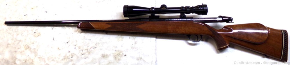 Nice old Weatherby Mark V Rifle in 300 Wby Mag with a 3-9 Redfield scope -img-0