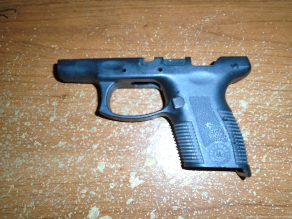 TAURUS PT-111 PRO 9MM GRIP FRAME WITH MAG RELEASE-img-0