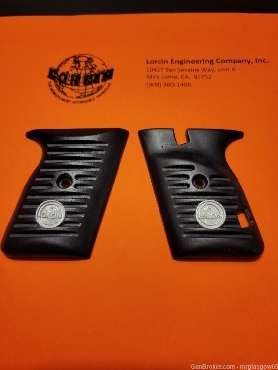 Lorcin Engineering Company L22 new black grips with Medallions-img-0