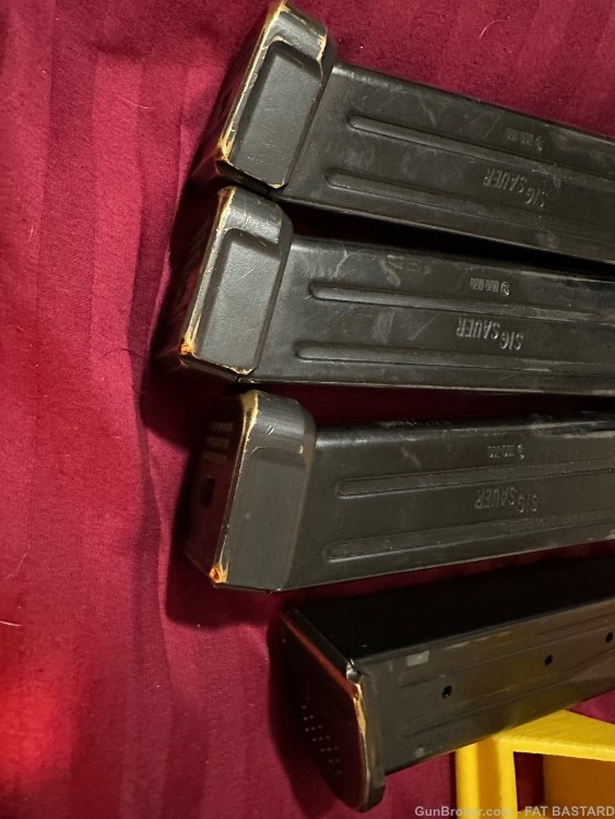 9 factory Sig 320 mags, brass baseplates, Wilson Combat goodies-img-0