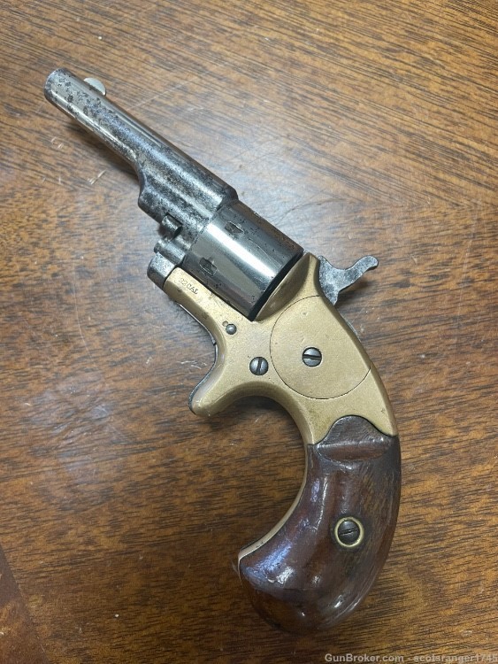 Colt 1871 Open Top Revolver 22 Caliber Brass Frame -img-0