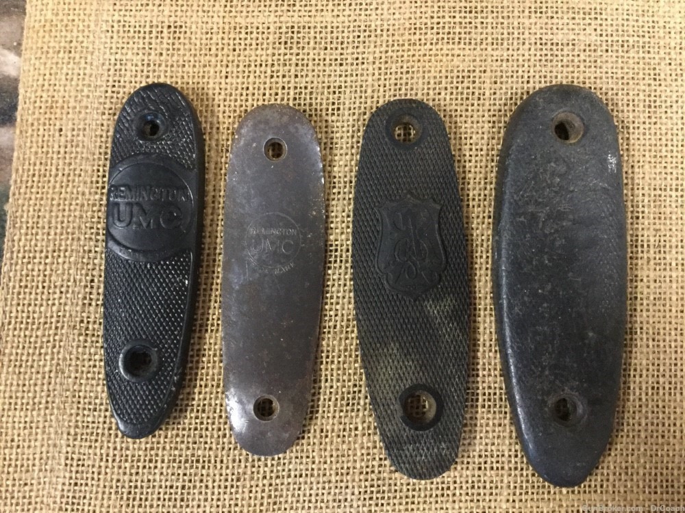 Four Remington vintage 22 rifle butt plates stock-img-0