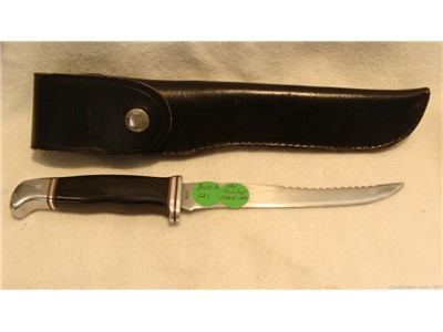 BUCK 121 Scaler with flap over sheath